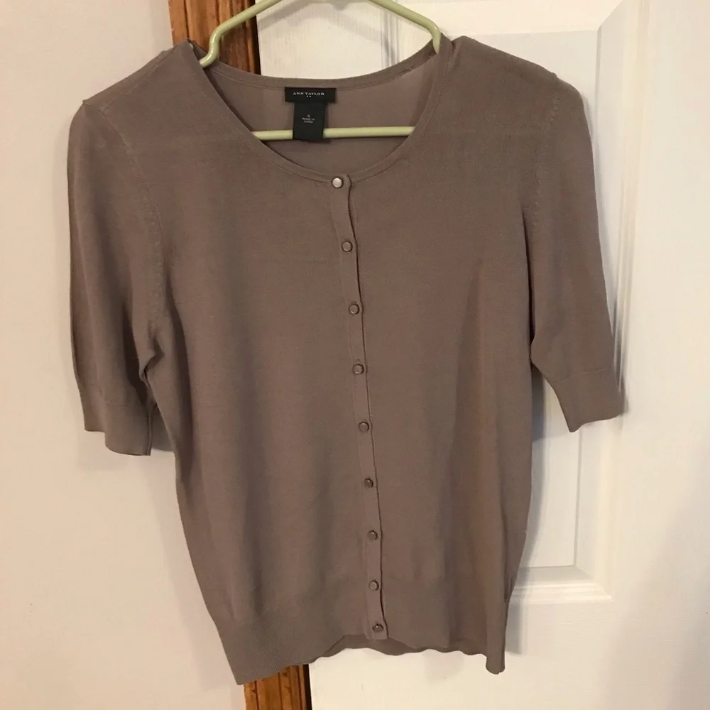 Ann Taylor size small short sleeved lightweight button down sweater. Light mauve